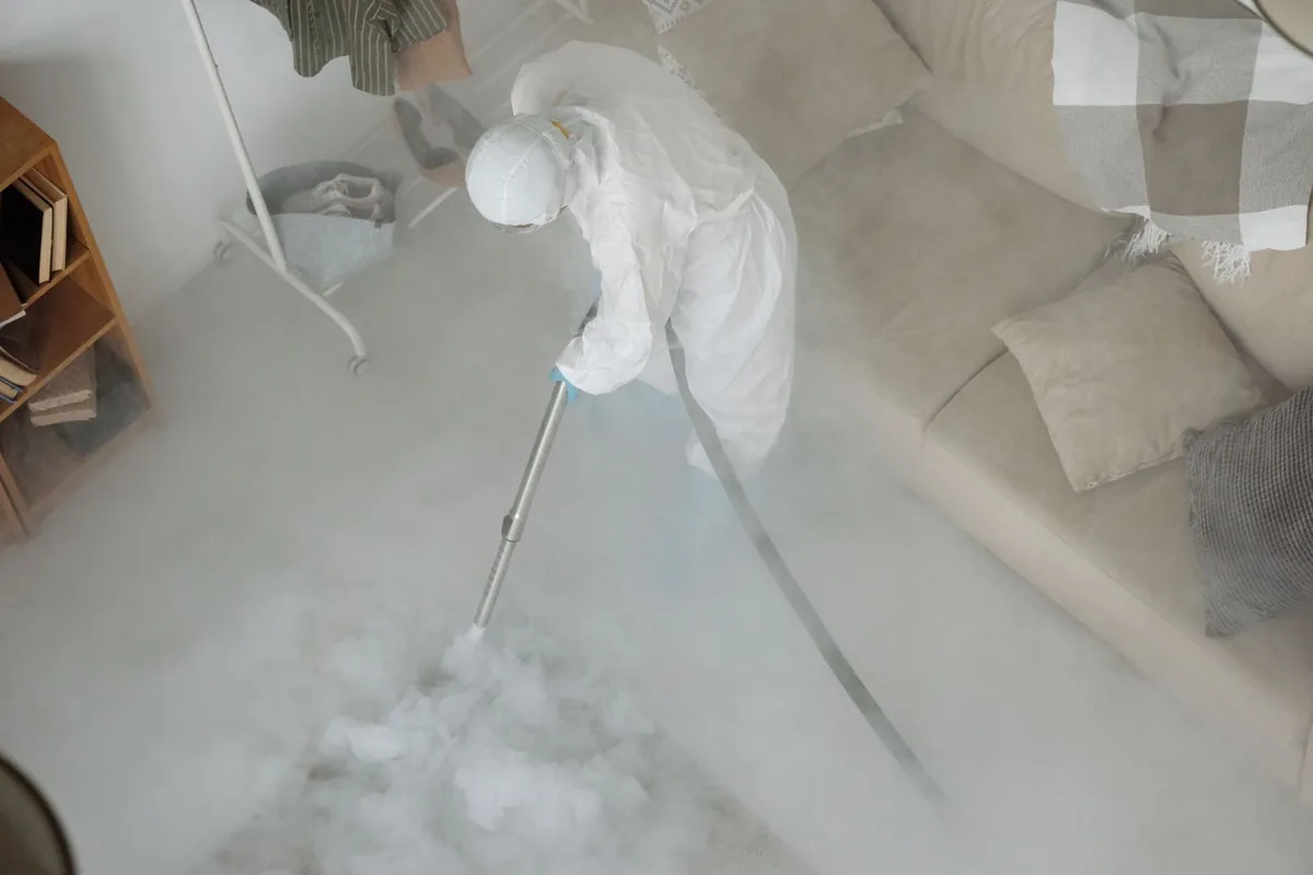 Biohazard cleanup technician in protective equipment, West Poplar, Philadelphia, PA